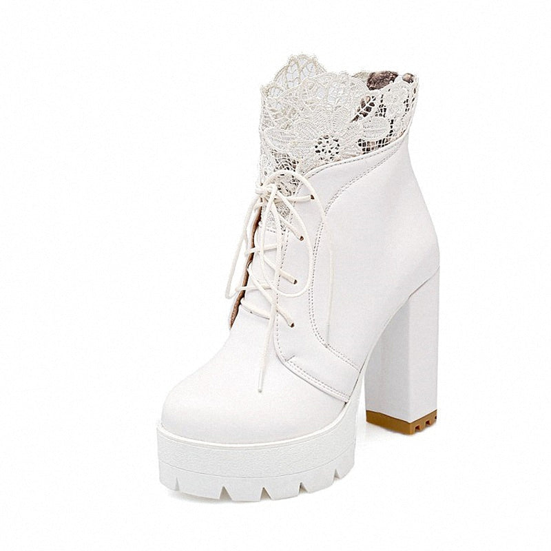 White Gothic lacing platform boots with high square heels and lace decoration for women.