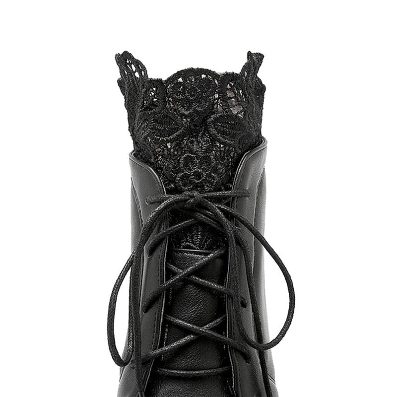 Close-up of women’s gothic black lacing platform boot with a lace top detail, perfect for stylish autumn outfits.