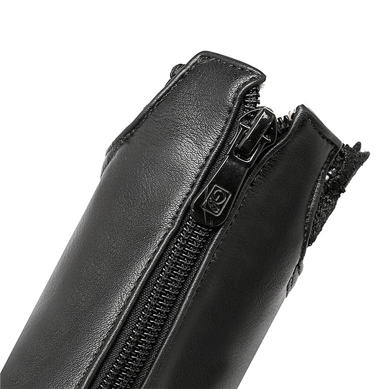 Close-up of a black zipper detail on gothic style ankle boot, featuring durable PU material and decorative lace.