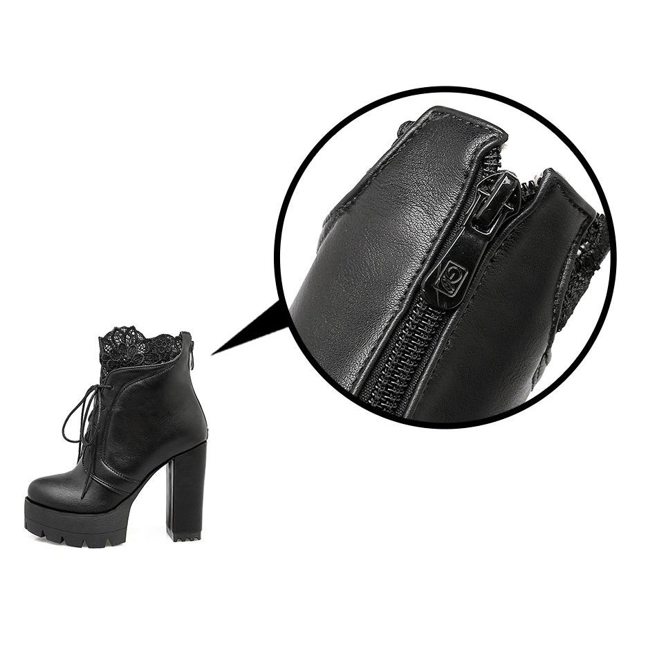 Women gothic lacing platform ankle boots in black with high heel and decorative lace detail.