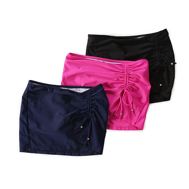 Women’s quick-dry swim skirts in navy, black, and pink with drawstring beads for stylish beachwear.