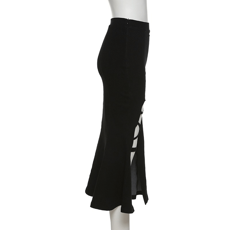 Women's black flared skirt with split, showcasing a gothic and alternative fashion style.