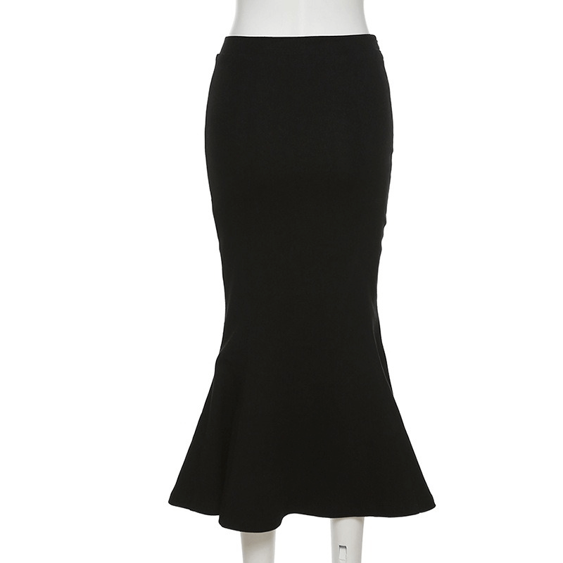 Women's black flared skirt with split, perfect for gothic style and alternative fashion, showcasing a chic silhouette.