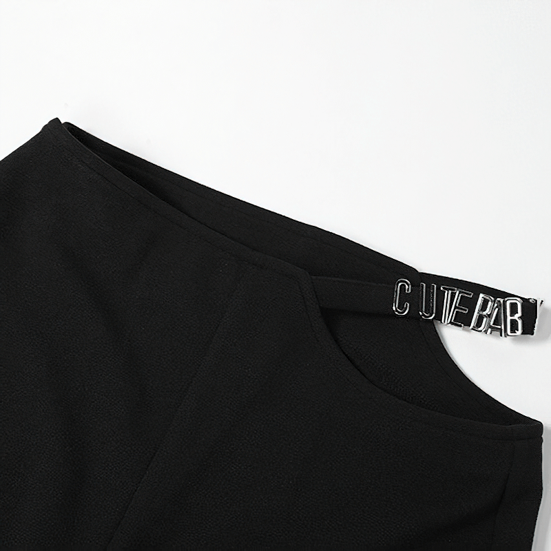 Close-up of women's black high-waisted flare pants showing stylish waistband with 'CUTE BAB' detail.