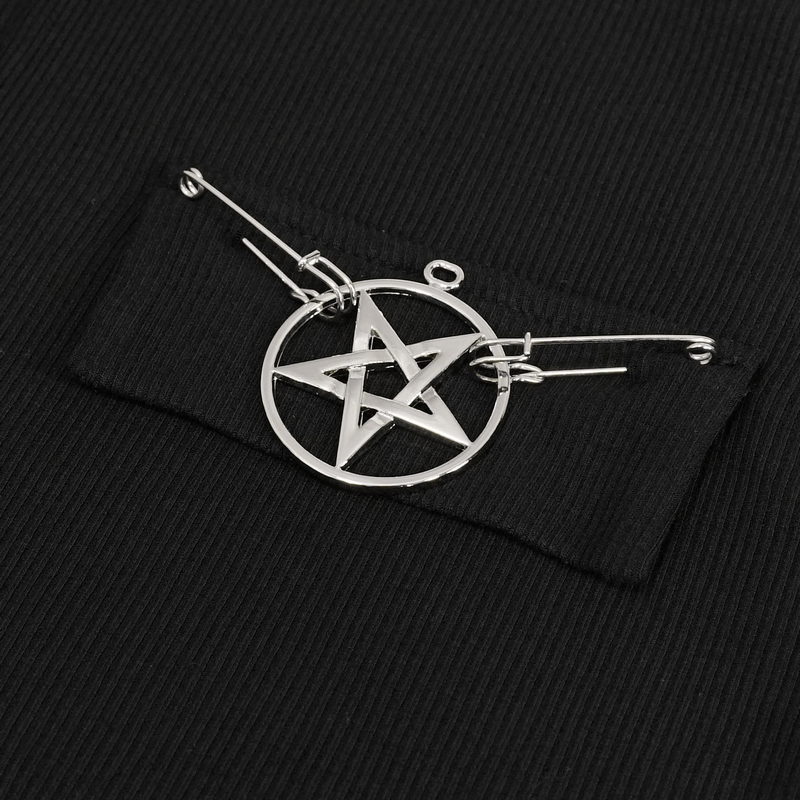 Close-up of a silver pentagram design on a black hoodie, highlighting gothic alternative fashion style.