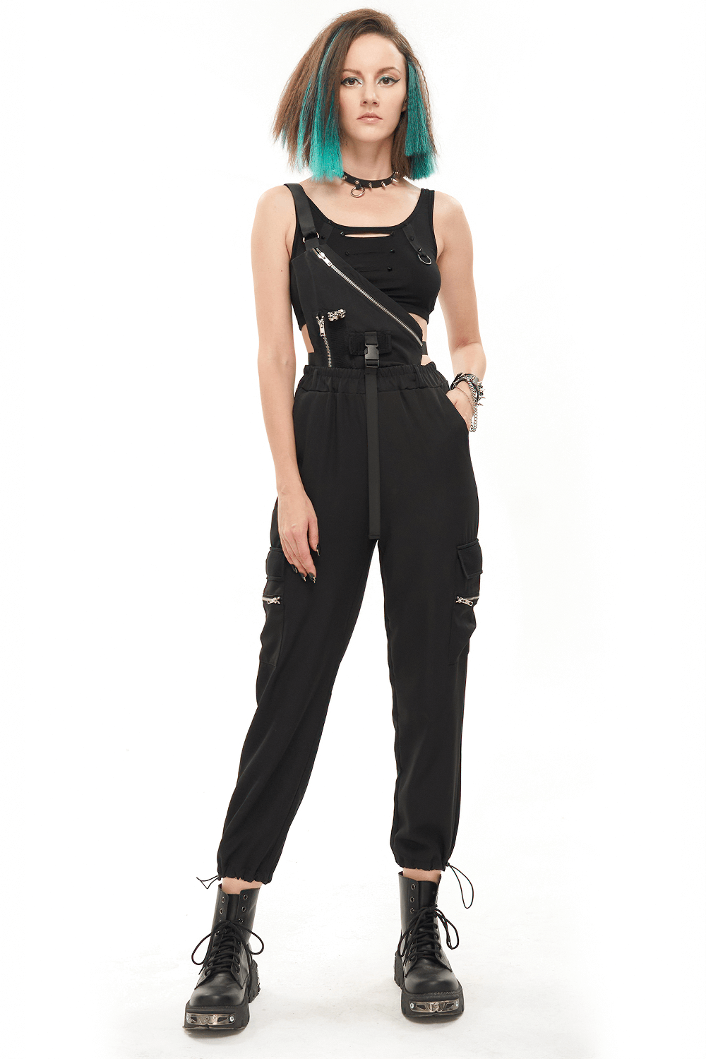 Stylish women's punk asymmetrical suspender pants with skull rivets and zipper, showcasing edgy street fashion.