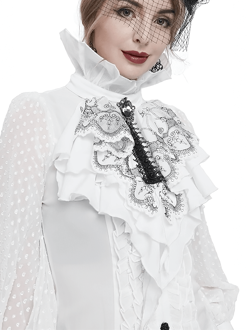 Elegant woman in a gothic floral embroidered ruffled necktie and spotted blouse, showcasing a unique fashion statement.