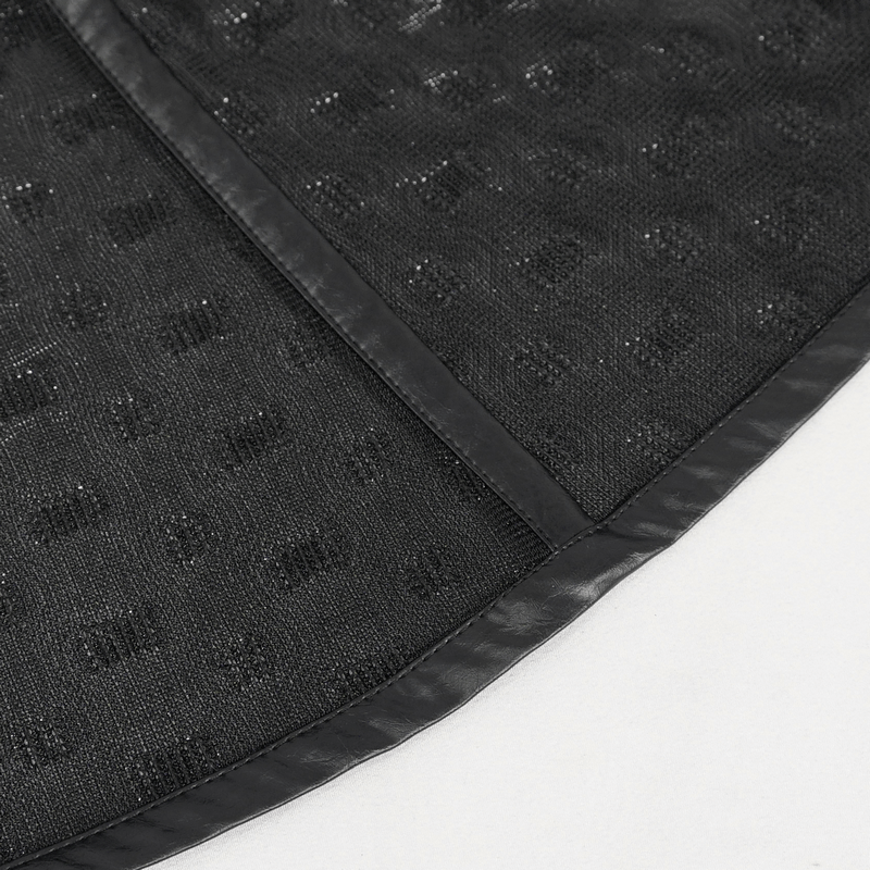 Close-up of textured black fabric with shiny dots, perfect for a gothic dress or stylish outfits.