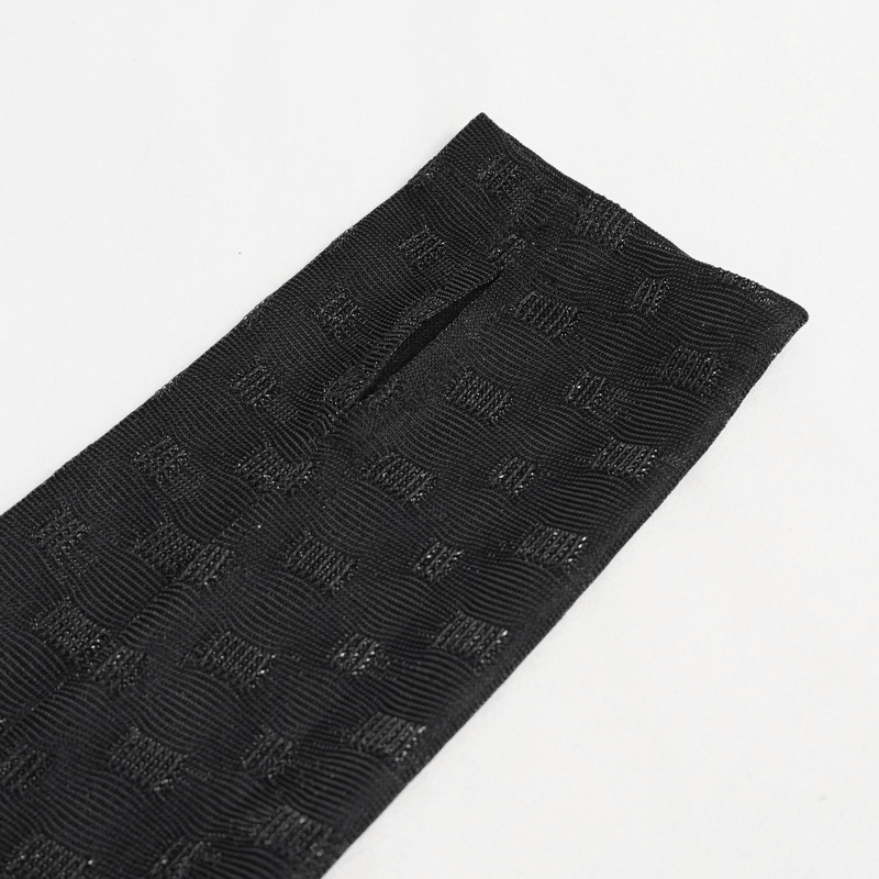 Close-up of textured black fabric for women's gothic dress, showcasing intricate patterns and soft material.