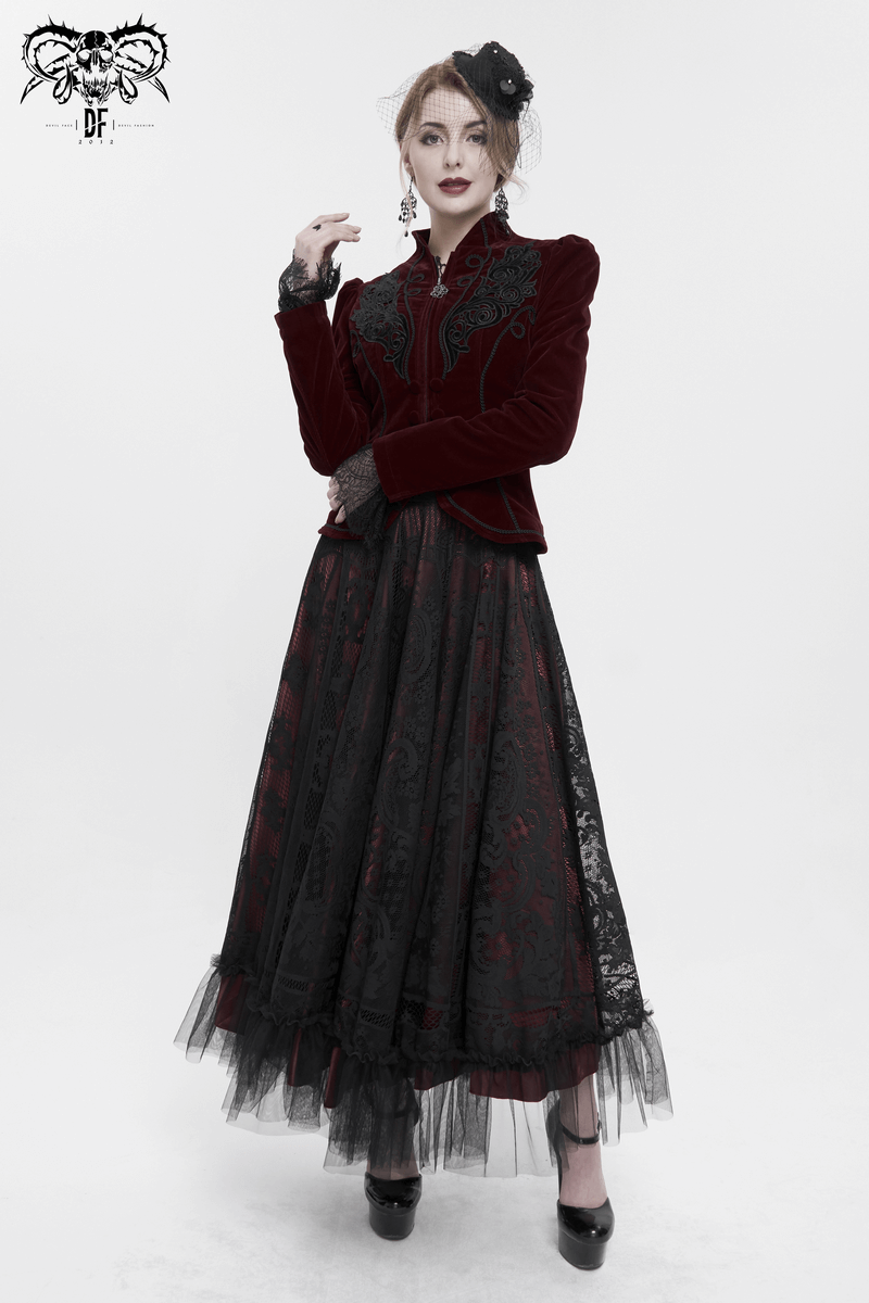 Stylish woman in a long black and wine red gothic skirt and velvet jacket, showcasing vintage elegance and charm.