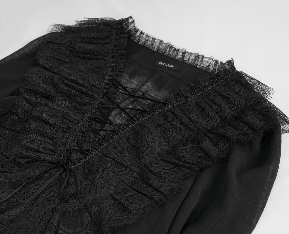 Elegant black women's gothic long sleeve top with lace-up front and ruffle detail, showcasing modern gothic fashion.