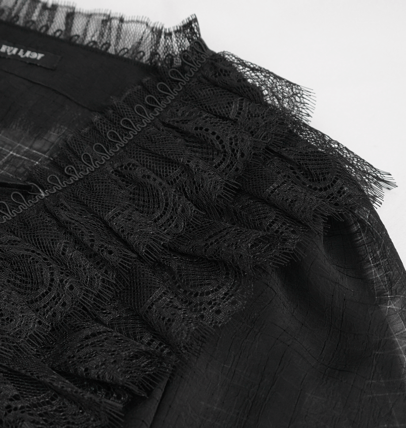 Close-up of a black women's gothic top with lace detail and ruffled design on the neckline.