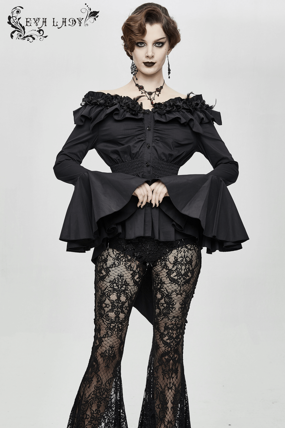 Women's gothic off-shoulder blouse with flare sleeves and lace pants, showcasing a stylish and bold look.