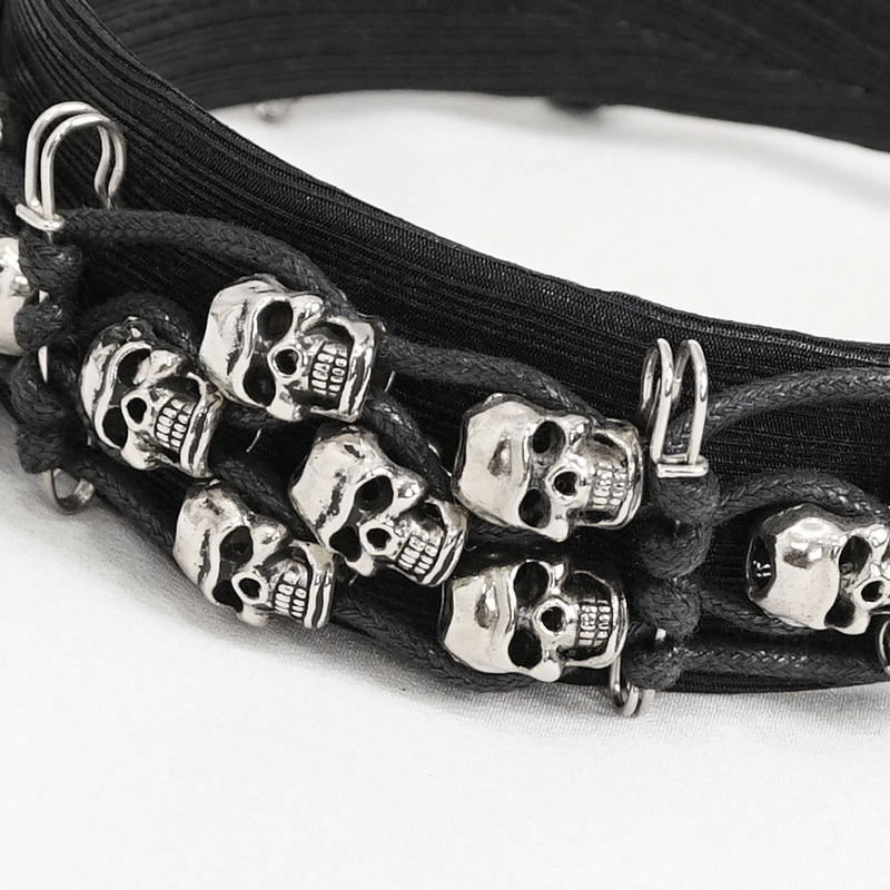 Stylish women's gothic skull hair band, featuring metallic skulls for a trendy alternative fashion look.