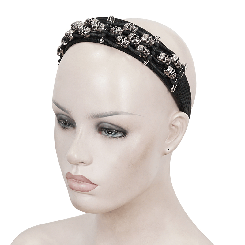 Women's gothic skull hair band displayed on a mannequin, perfect for alternative fashion and stylish outfits.