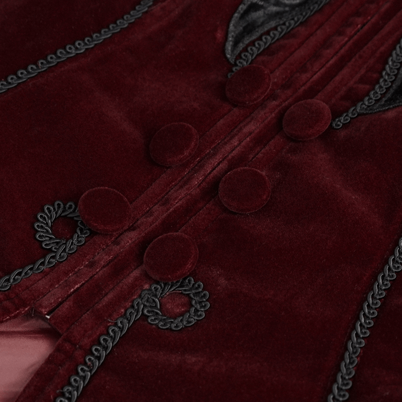 Close-up of women's gothic velvet jacket in wine red, featuring decorative buttons and intricate lace details.