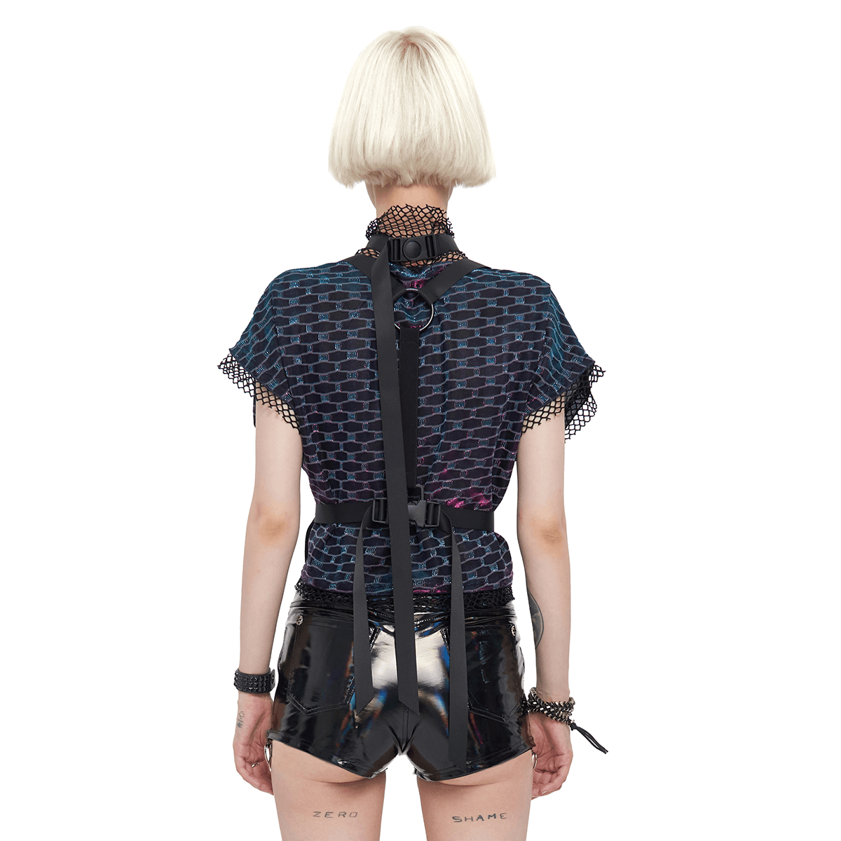 Back view of a woman in a grunge batwing mesh top with buckle strap harness, showcasing a stylish and edgy look.