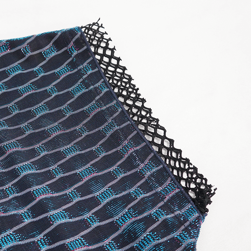 Close-up of a grunge mesh top featuring a stylish black lace edge detail and vibrant blue accents.