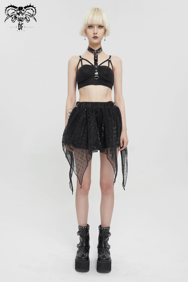 Edgy model wearing a black mesh skirt with layers and a crop top in grunge style, showcasing unique fashion.