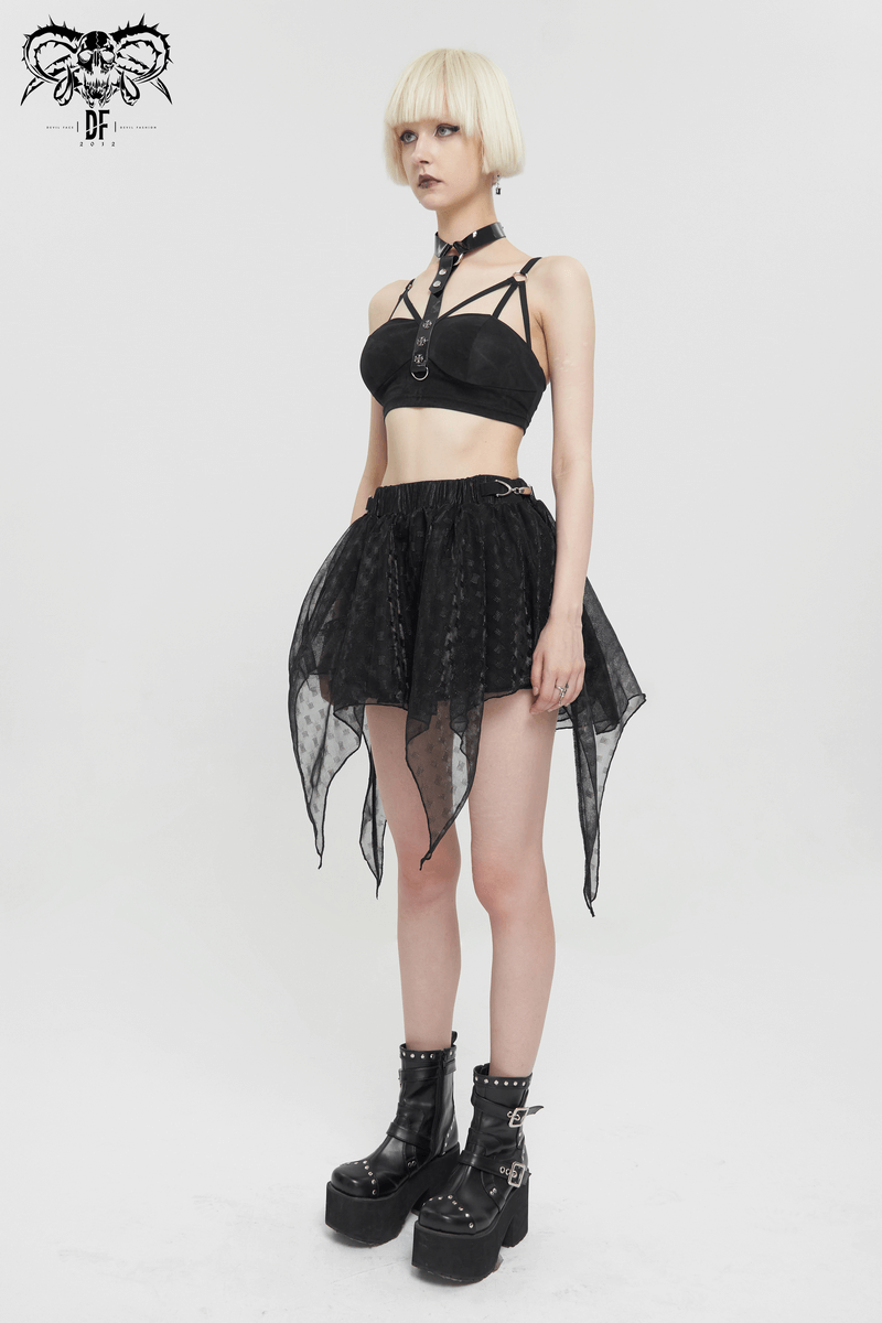 Model wearing a women's black irregular layered mesh skirt with a grunge style top and chunky boots.