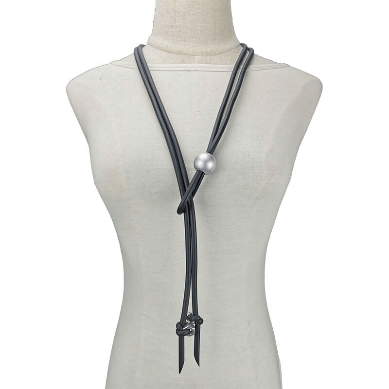 Women's long punk style necklace with pearls and screws, adjustable rubber design perfect for edgy outfits.