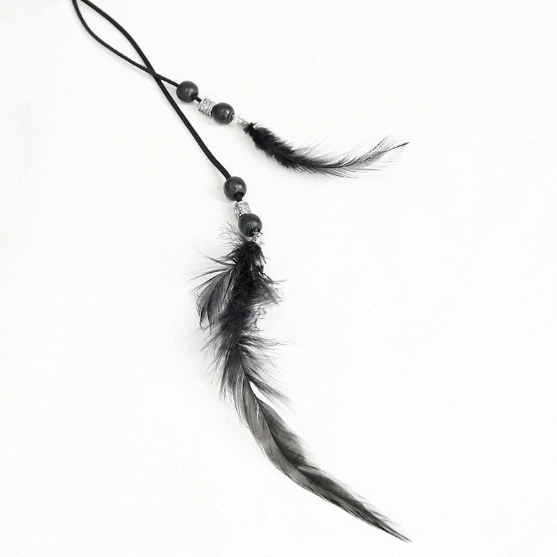 Gothic black feather pendant necklace with beads, perfect accent for edgy outfits and fashion accessories.