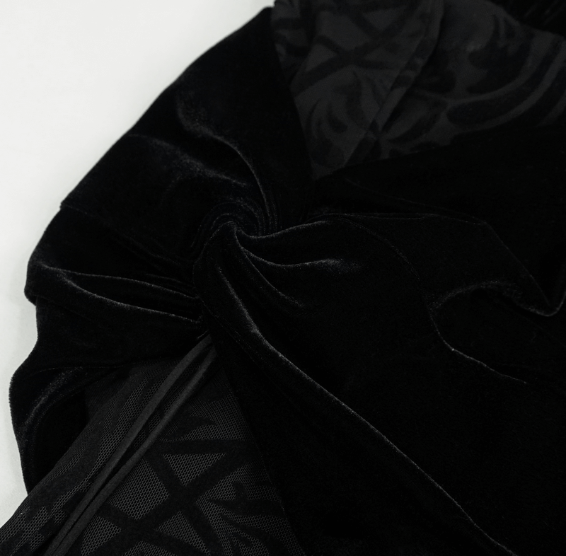 Close-up of luxurious black velvet fabric featuring intricate gothic patterns and textures for stylish flared pants.