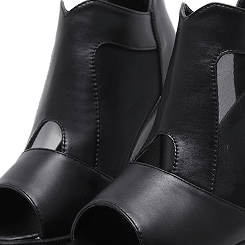 Black open-toe wedge sandals with breathable cutouts, perfect for stylish summer outfits.