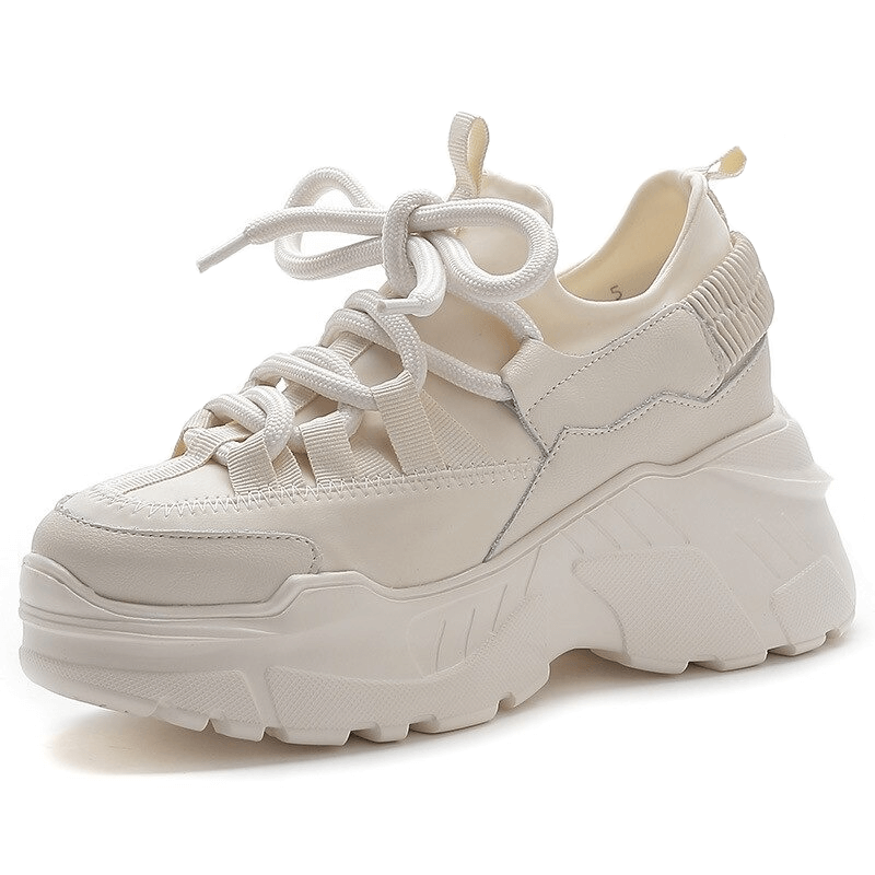 Stylish women's genuine leather platform sneakers in cream color with lace-up design and thick soles.