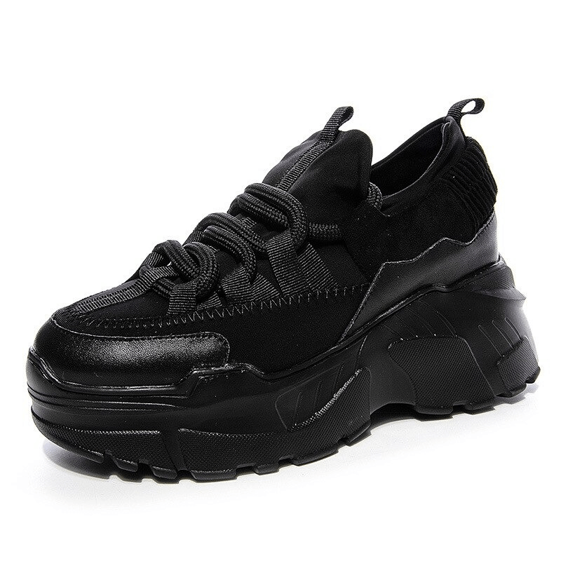 Women's stylish black platform sneakers with lace-up design and chunky sole for casual comfort.