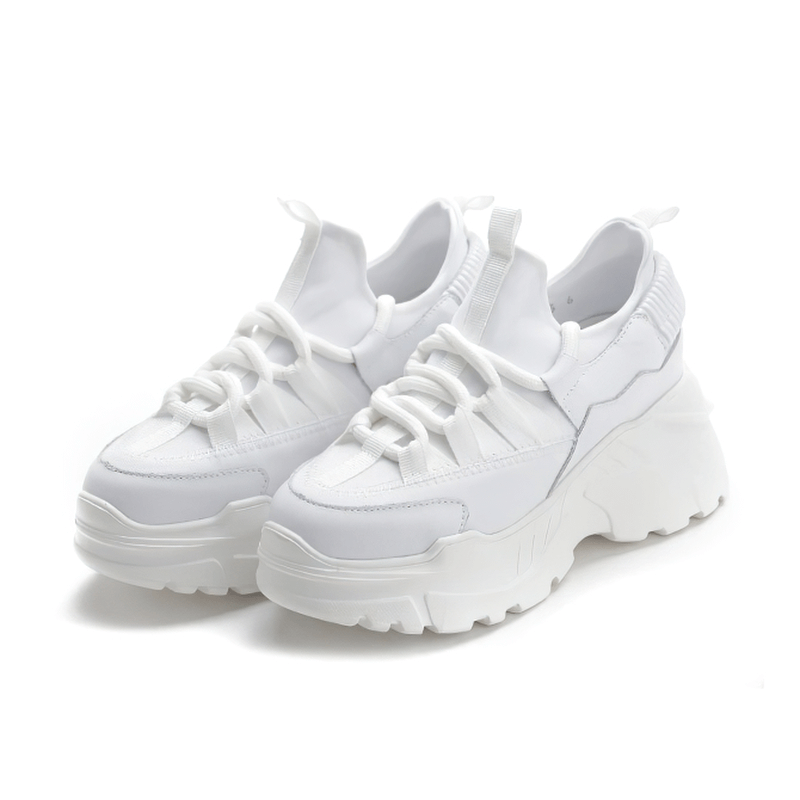 Stylish women's platform sneakers made of genuine leather, showcasing a trendy lace-up design for casual wear.