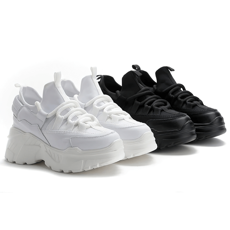 Trendy women's platform sneakers in black and white, featuring lace-up design for stylish casual looks.