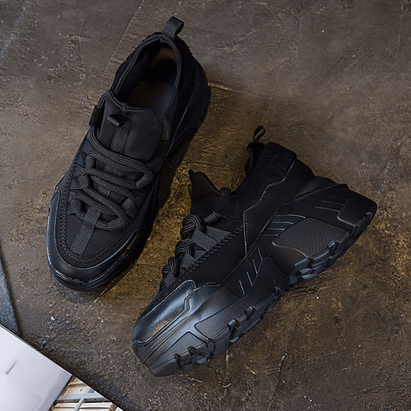 Stylish black platform sneakers for women, featuring genuine leather and lace-up design, perfect for casual outfits.