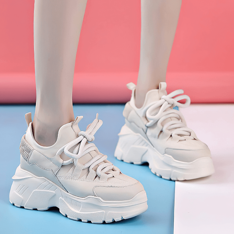 Women's stylish platform genuine leather sneakers with lace-up design, perfect for casual outings.