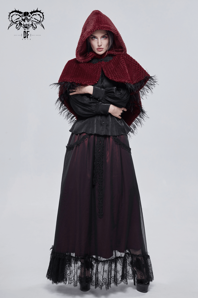 Gothic women's red hooded cape with fringes, stylishly paired with a black blouse and long skirt.