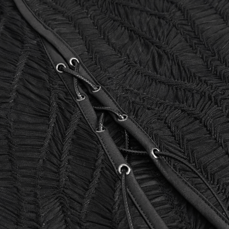 Close-up of black dress fabric featuring textured design and lace-up detail, perfect for punk fashion enthusiasts.