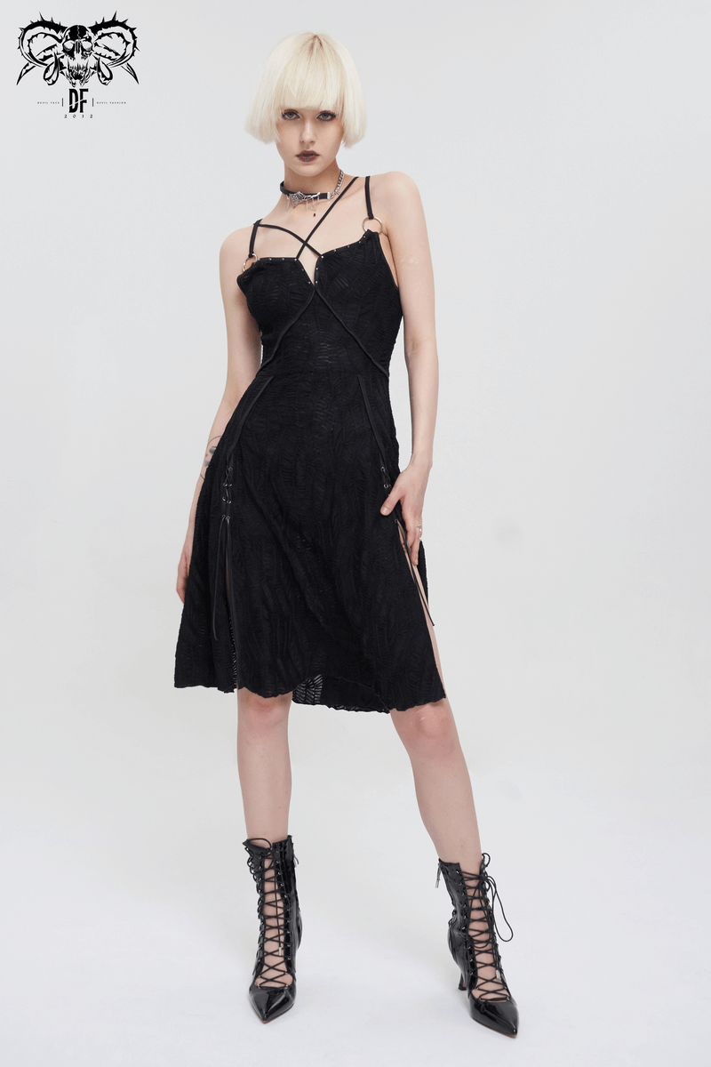 Women's sexy black slit hem short dress in punk style with cross strap detail.