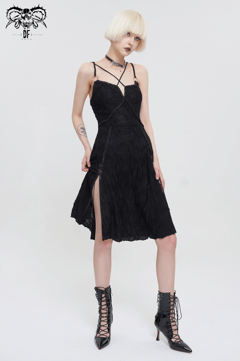 Trendy women's black gothic punk short dress with a slit hem and cross straps, perfect for fashion-forward styling.