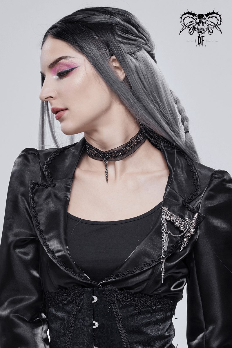 Alternative model showcasing a gothic style with a skull chain brooch and elegant dark attire.