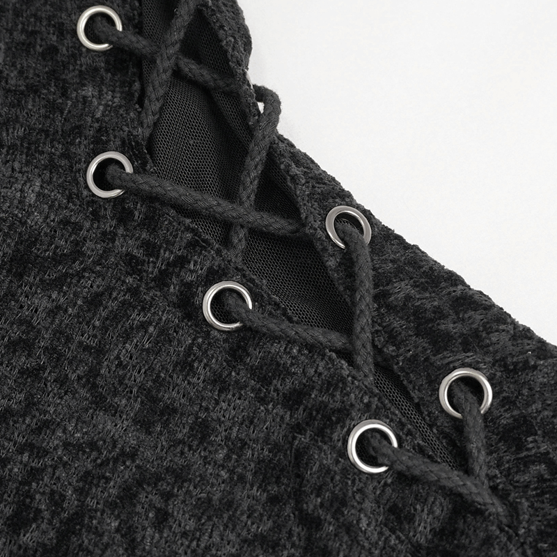 Close-up of women's gothic style ripped sweatshirt featuring lace-up detailing and metallic eyelets.