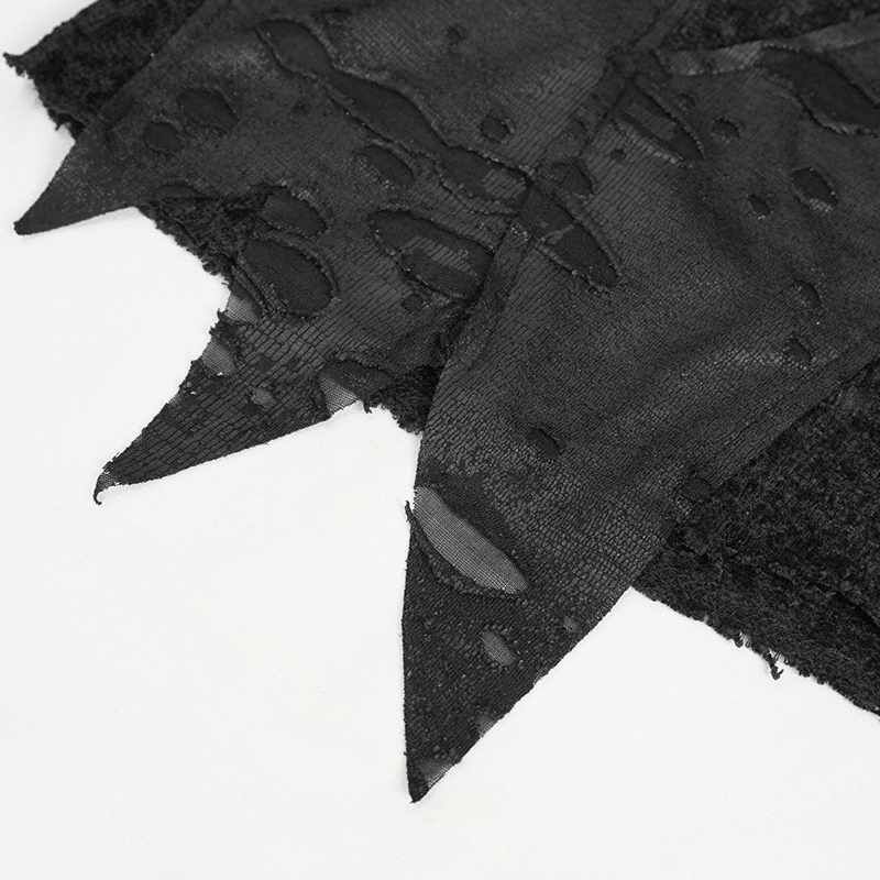 Close-up of edgy black ripped fabric from a women's gothic turtleneck sweatshirt, showcasing alternative fashion design.
