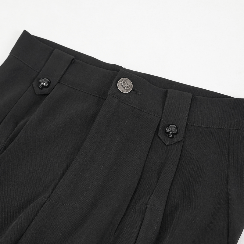 Close-up of women's punk jogger pants waistband with skull buttons for a trendy look.