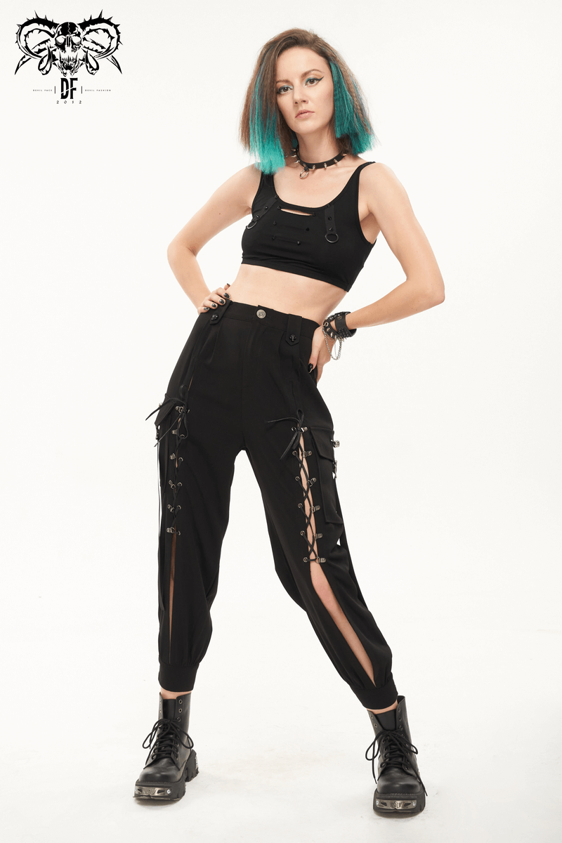 Trendy women's punk jogger pants with big pockets and lace-up details, showcased by a model with edgy style.