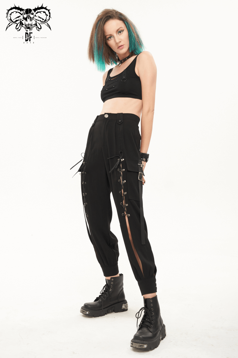 Fashionable punk-style women's jogger pants with big pockets and trendy lace-up details.