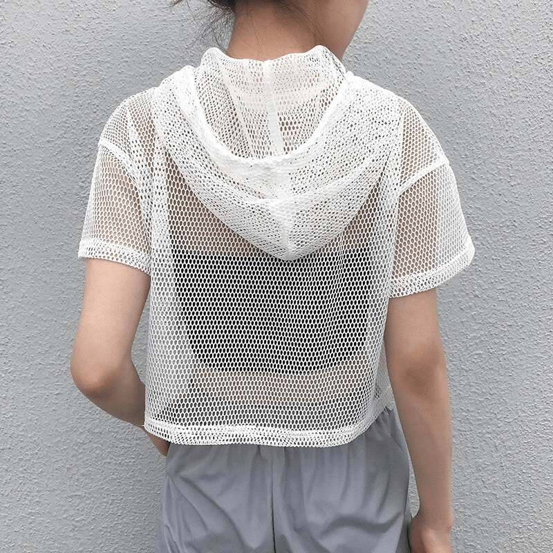 Back view of a woman wearing a white transparent hooded top, showcasing breathable mesh fabric in a trendy style.
