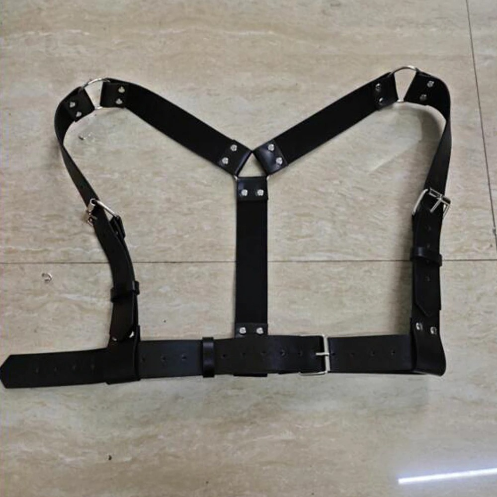 Women’s black faux leather body harness with adjustable chrome buckles, perfect for Goth fashion, cosplay, or roleplay lingerie night.