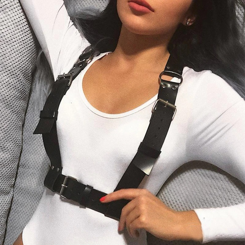 Black faux leather body harness with adjustable chrome buckles, ideal for gothic fashion, cosplay, or roleplay lingerie night.