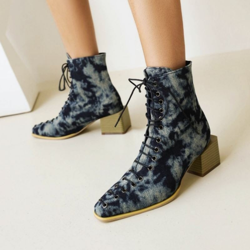 Mixed color ankle boots for women with thick heels and lace-up design, perfect for fashionable casual looks.