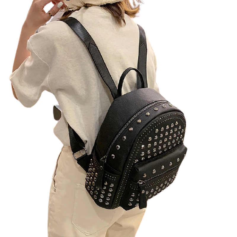 Stylish black casual backpack for women with zipper and rivet details, perfect for gothic and casual fashion.