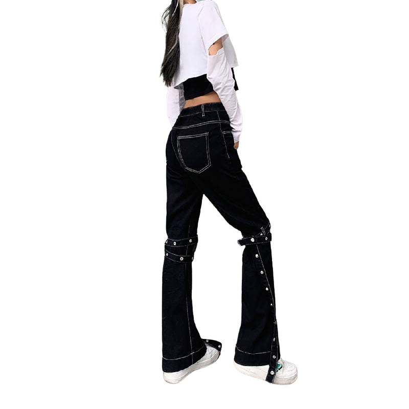 Women wearing high waist black rivet trousers with zippers, styled for rave outfits, showcasing Gothic fashion flair.